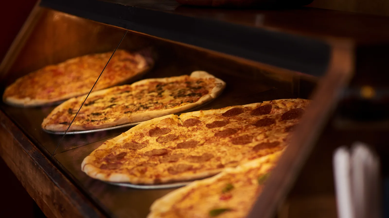 Deerfield Beach's Munchy's Pizza Swore Off AI, and Its Handwritten Sign Went Viral